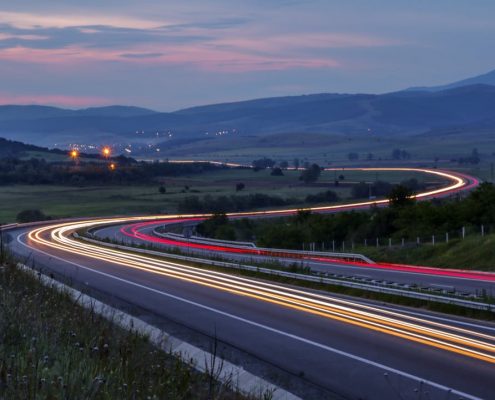 time lapse highway at dusk